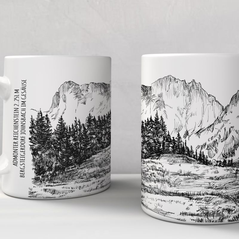 Pair of illustrated white ceramic mugs with mountain and valley scenery