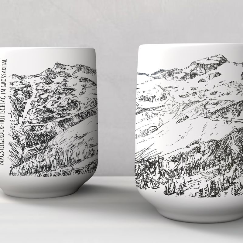 Two white ceramic mugs featuring detailed Alpine landscape illustrations