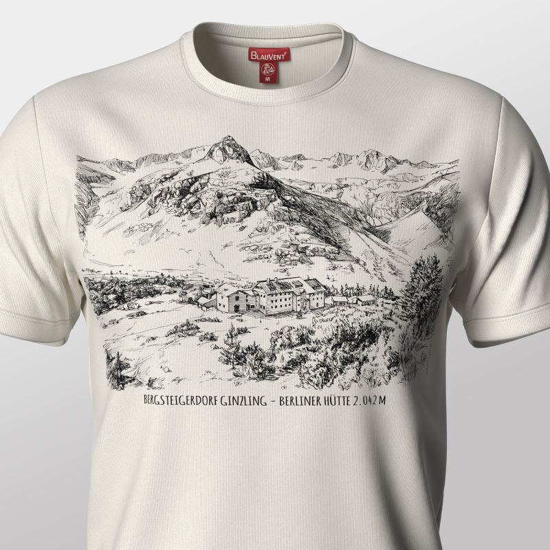 Close-up of a printed ivory T-shirt showing detailed mountain artwork