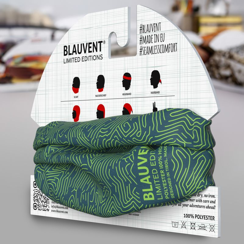 Green and blue topographic-print multifunctional neckwarmer on branded cardboard packaging.
