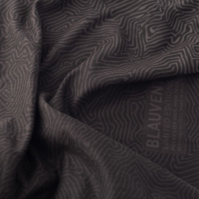 Close-up of charcoal grey neckwarmer fabric with a tonal topographic contour-line print.