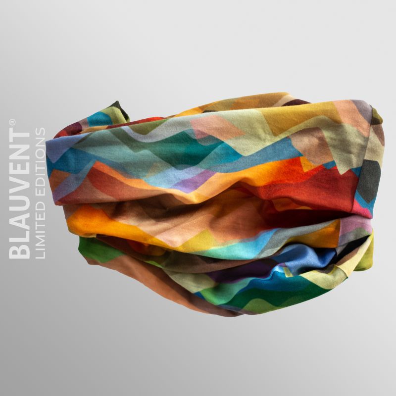 Folded multifunctional neckwarmer featuring a bright multicoloured abstract geometric print.
